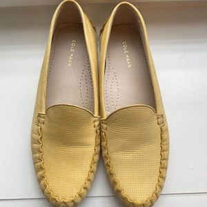 Yellow Cole Haan loafer style shoe